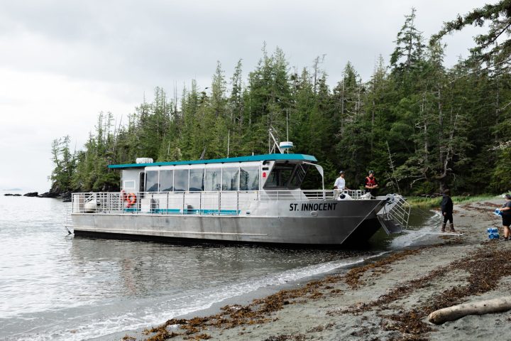 a man driving a boat in the water