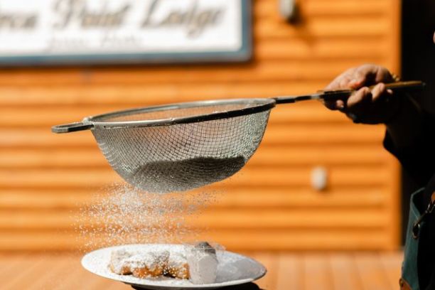 a person standing in front of an oven