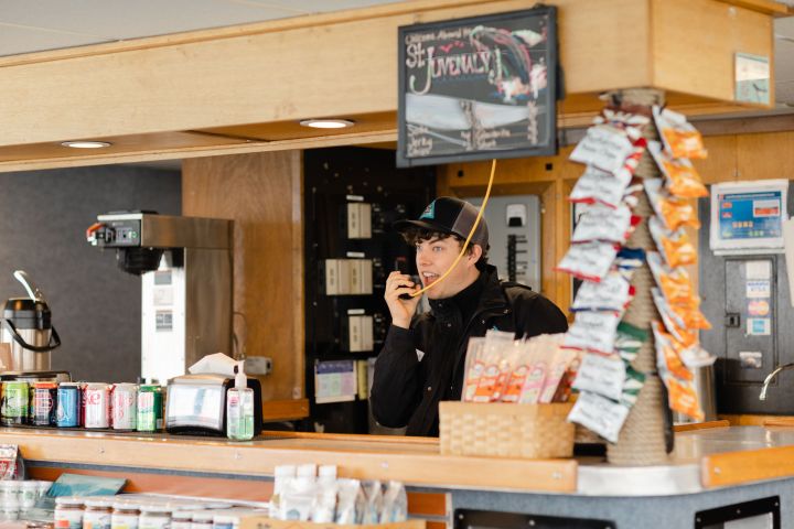 a person that is standing in the kitchen