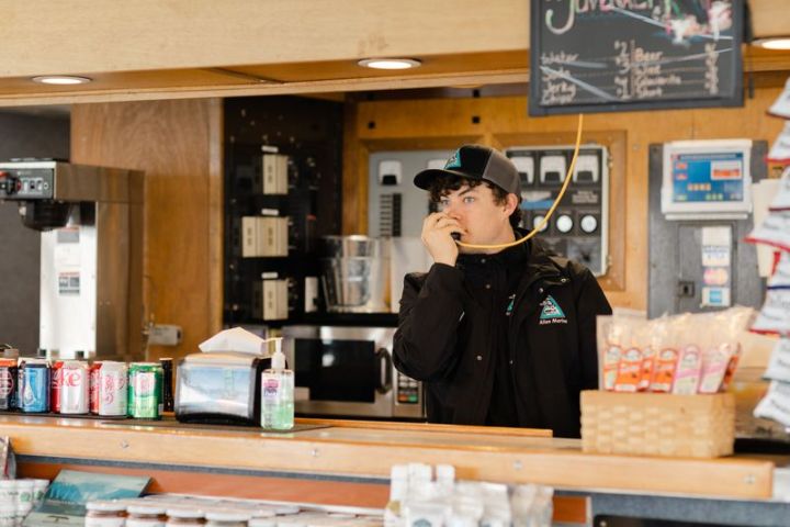 a person standing in front of a store