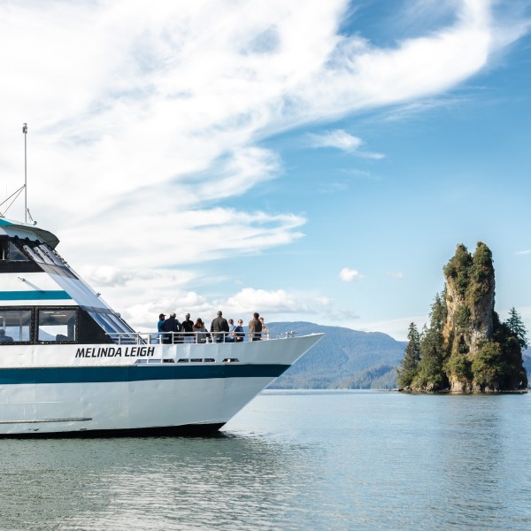 a small boat in a large body of water