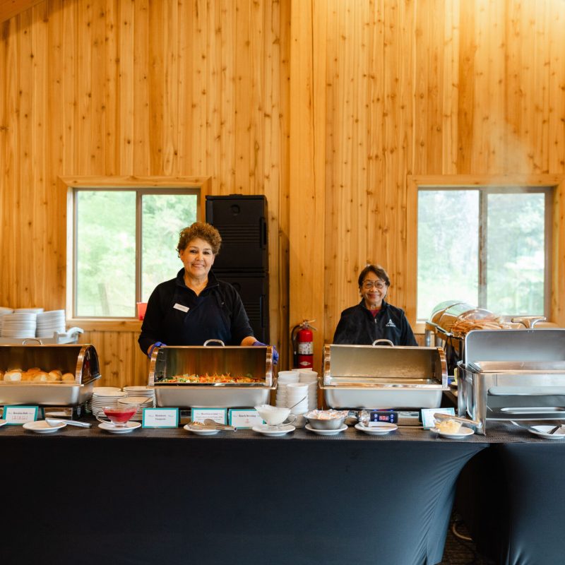 a group of people sitting at a table