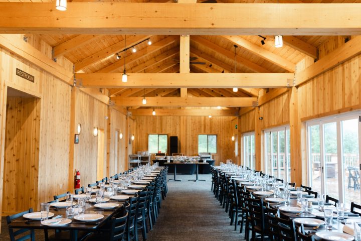a row of wooden benches sitting on top of a table