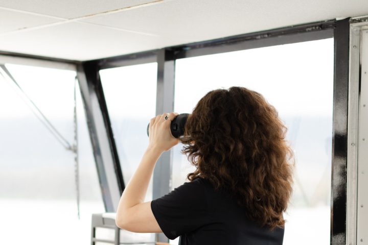 a person standing in front of a window