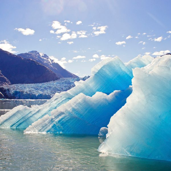 a view of water and a mountain in the background