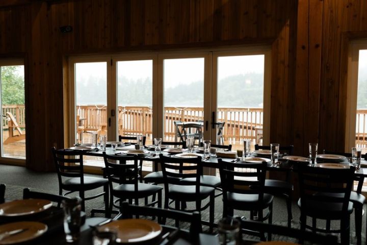 a dining room table in front of a window
