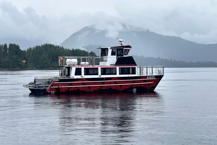a small boat in a large body of water