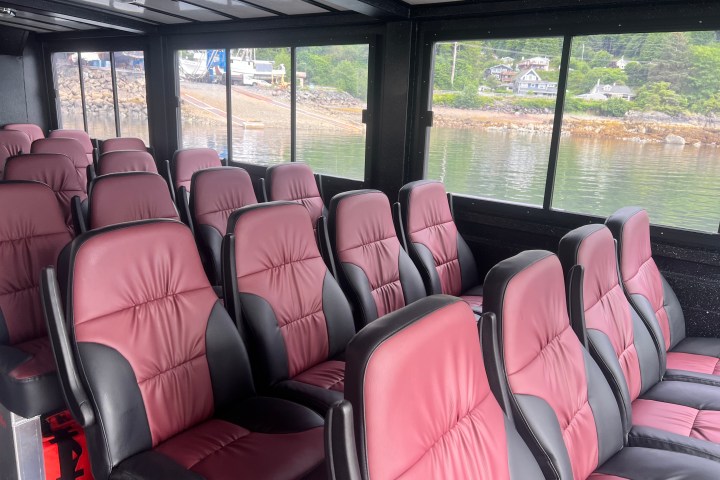 a boat filled with furniture and a large window